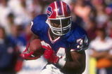 29 Sep 1991:  Running back Thurman Thomas of the Buffalo Bills runs with the ball during a game against the Chicago Bears at Rich Stadium in Orchard Park, New York.  The Bills won the game, 35-20. Mandatory Credit: Rick Stewart  /Allsport