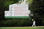 AUGUSTA, GA - APRIL 10:  A caddie walks off the 11th green during the second round of the 2009 Masters Tournament at Augusta National Golf Club on April 10, 2009 in Augusta, Georgia.  (Photo by Harry How/Getty Images)