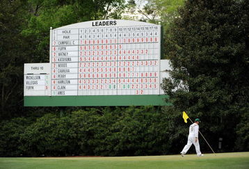 AUGUSTA, GA - APRIL 10:  A caddie walks off the 11th green during the second round of the 2009 Masters Tournament at Augusta National Golf Club on April 10, 2009 in Augusta, Georgia.  (Photo by Harry How/Getty Images)
