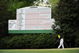 AUGUSTA, GA - APRIL 10: A caddie walks off the 11th green during the second round of the 2009 Masters Tournament at Augusta National Golf Club on April 10, 2009 in Augusta, Georgia. (Photo by Harry How/Getty Images)