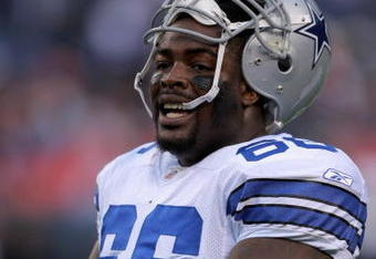 DENVER - AUGUST 16:  Nose tackle Tank Johnson #66 of the Dallas Cowboys warms up prior to facing the Denver Broncos during preseason NFL action at Invesco Field at Mile High on August 16, 2008 in Denver, Colorado. The Broncos defeated the Cowboys 23-13.  (Photo by Doug Pensinger/Getty Images)