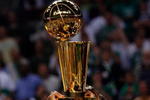 BOSTON - JUNE 17:  Paul Pierce #34 of the Boston Celtics holds up the Larry O'Brien trophy after Game Six of the 2008 NBA Finals against the Los Angeles Lakers on June 17, 2008 at TD Banknorth Garden in Boston, Massachusetts. The Celtics defeated the Lakers 131-92 to win the NBA Championship.  NOTE TO USER: User expressly acknowledges and agrees that, by downloading and/or using this Photograph, user is consenting to the terms and conditions of the Getty Images License Agreement.  (Photo by Jim Rogash/Getty Images)