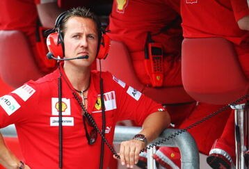 KUALA LUMPUR, MALAYSIA - APRIL 04:  Former Ferrari Formula One World Champion Michael Schumacher of Germany is seen on the Ferrari pitwall before qualifying for the Malaysian Formula One Grand Prix at the Sepang Circuit on April 4, 2009 in Kuala Lumpur, Malaysia.  (Photo by Clive Mason/Getty Images)