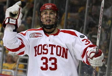WASHINGTON - APRIL 9:  Colin Wilson #33 of the Boston Terriers celebrates after he scored the game winning goal against the Vermont Catamounts during the NCAA Men's Frozen Four Semifinal game at the Verizon Center April 9, 2009 in Washington, DC. The Boston Terriers defeated the Vermont Catamounts 5-4.  (Photo by Elsa/Getty Images)