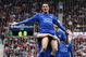 SUNDERLAND, ENGLAND - APRIL 11:  Federico Macheda of Manchester United is lifted up by team mate Wayne Rooney after scoring his team's second goal during the Barclays Premier League match between Sunderland and Manchester United at The Stadium of Light on April 11, 2009 in Sunderland, England.  (Photo by Alex Livesey/Getty Images)
