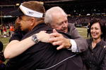 NEW ORLEANS - NOVEMBER 04:  Head Coach Sean Payton of the New Orleans Saints gets a hug from Team Owner Tom Benson after defeating the Jacksonville Jaguars on November 4, 2007 at the Louisiana Superdome in New Orleans, Louisiana. The Saints defeated the Jaguars 41-24.  (Photo by Chris Graythen/Getty Images)