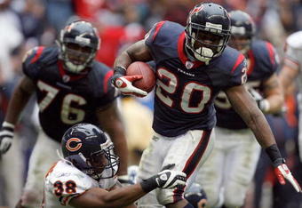 HOUSTON - DECEMBER 28:  Steve Slaton #20 of the Houston Texans is tackled short of the goal line by Danieal Manning #38 of the Chicago Bears during the second half at the Reliant Stadium December 28, 2008 in Houston, Texas.  The Texans won 31-24.  (Photo by Harry How/Getty Images)