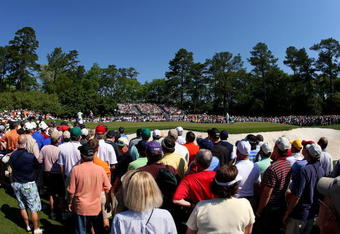 AUGUSTA, GA - APRIL 11:  A general view of the play at the first green during the third round of the 2009 Masters Tournament at Augusta National Golf Club on April 11, 2009 in Augusta, Georgia.  (Photo by Andrew Redington/Getty Images)