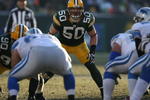 GREEN BAY, WI - DECEMBER 28: A.J. Hawk #50 of the Green Bay Packers awaits the snap against the Detroit Lions on December 28, 2008 at Lambeau Field in Green Bay, Wisconsin. The Packers defeated the Lions 31-21. The Packers defeated the Lions 31-21. (Photo by Jonathan Daniel/Getty Images)