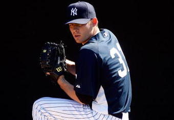 TAMPA, FL - FEBRUARY 14:  Pitcher Ian Kennedy #31 of the New York Yankees pitches during a Spring Training workout at the George M. Steinbrenner Field on February 14, 2009 in Tampa, Florida.  (Photo by J. Meric/Getty Images)