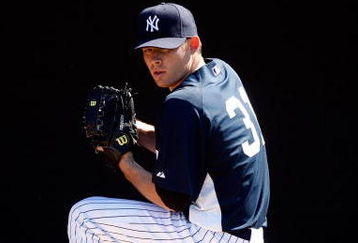 TAMPA, FL - FEBRUARY 14:  Pitcher Ian Kennedy #31 of the New York Yankees pitches during a Spring Training workout at the George M. Steinbrenner Field on February 14, 2009 in Tampa, Florida.  (Photo by J. Meric/Getty Images)