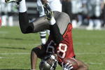 TAMPA, FL - DECEMBER 28: Wide receiver Antonio Bryant #89 of the Tampa Bay Buccaneers tumbles after a midfield catch against the Oakland Raiders at Raymond James Stadium on December 28, 2008 in Tampa, Florida.  (Photo by Al Messerschmidt/Getty Images)