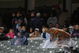 CLEVELAND - APRIL 10:  Fans find cover during a rain delay in the Cleveland Indians and Toronto Blue Jays game April 10, 2009 at Progressive Field in Cleveland, Ohio.  (Photo by Matt Sullivan/Getty Images)