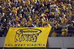 MORGANTOWN, WV - DECEMBER 1: Fans of the West Virginia Mountaineers watch the game during the game against the Pittsburgh Panthers at Milan Puskar Stadium on December 1, 2007 in Morgantown, West Virginia. (Photo by Kevin C. Cox/Getty Images)