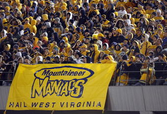 MORGANTOWN, WV - DECEMBER 1: Fans of the West Virginia Mountaineers watch the game during the game against the Pittsburgh Panthers at Milan Puskar Stadium on December 1, 2007 in Morgantown, West Virginia. (Photo by Kevin C. Cox/Getty Images)