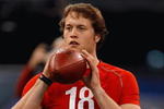 INDIANAPOLIS, IN - FEBRUARY 22:  Quarterback Matthew Stafford of USC passes the football during the NFL Scouting Combine presented by Under Armour at Lucas Oil Stadium on February 22, 2009 in Indianapolis, Indiana. (Photo by Scott Boehm/Getty Images)