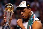 BOSTON - JUNE 17:  Paul Pierce #34 of the Boston Celtics celebrates with the Finals MVP trophy at the end of Game Six of the 2008 NBA Finals against the Los Angeles Lakers on June 17, 2008 at TD Banknorth Garden in Boston, Massachusetts. The Celtics defeated the Lakers 131-92 to win the NBA Championship.  NOTE TO USER: User expressly acknowledges and agrees that, by downloading and/or using this Photograph, user is consenting to the terms and conditions of the Getty Images License Agreement.  (Photo by Jim Rogash/Getty Images)