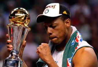 BOSTON - JUNE 17:  Paul Pierce #34 of the Boston Celtics celebrates with the Finals MVP trophy at the end of Game Six of the 2008 NBA Finals against the Los Angeles Lakers on June 17, 2008 at TD Banknorth Garden in Boston, Massachusetts. The Celtics defeated the Lakers 131-92 to win the NBA Championship.  NOTE TO USER: User expressly acknowledges and agrees that, by downloading and/or using this Photograph, user is consenting to the terms and conditions of the Getty Images License Agreement.  (Photo by Jim Rogash/Getty Images)