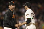 SAN FRANCISCO - JUNE 03:  Pitcher Barry Zito #75 hands the ball to manager Bruce Bochy #15 of the San Francisco Giants in the fifth inning against the New York Mets as Zito is taken out of the game June 3, 2008 at AT&T Park in San Francisco, California.  (Photo by Greg Trott/Getty Images)