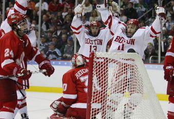 WASHINGTON - APRIL 11:  Nick Bonino #13 of the Boston Terriers and teamate Zach Cohen #11 celebrate a goal the final minutes against the Miami Red Hawks during the NCAA Men's Frozen Four Championship game on April 11, 2009 at the Verizon Center in Washington, DC.  (Photo by Elsa/Getty Images)