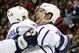 RALEIGH, NC - DECEMBER 18:  Teammate Thomas Kaberle #15 celebrates with Boyd Devereaux #22 of the Toronto Maple Leafs after Devereaux's goal against the Carolina Hurricanes during their game at the RBC Center on December 18, 2007 in Raleigh, North Carolina.  (Photo by Streeter Lecka/Getty Images)