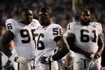 SAN DIEGO - DECEMBER 04:  Linebacker Derrick Burgess #56 of the Oakland Raiders stands with teammates during their NFL Game against the San Diego Chargers on December 4, 2008 at Qualcomm Stadium in San Diego, California.  (Photo by Harry How/Getty Images)