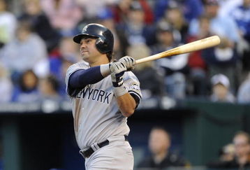 KANSAS CITY, MO - APRIL 11: Nick Swisher #33 of the New York Yankees watches a 2-run home run against the Kansas City Royals on April 11, 2009 at Kauffman Stadium in Kansas City, Missouri. (Photo by G. Newman Lowrance/Getty Images)