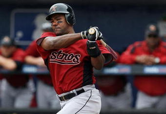 PORT ST LUCIE, FL - MARCH 01:  Miguel Tejada #10 of the Houston Astros makes contact against the New York Mets during a spring training game at Tradition Field on March 1, 2009 in Port St Lucie, Florida. The Mets defeated the Astros 13-1.  (Photo by Doug Benc/Getty Images)