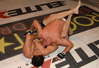 STUDIO CITY, CA - MAY 19:  MMA fighters Jake Shields (top) and Nick Diaz demonstrate MMA fighting techniques at CBS's 'Elite XC Saturday Night Fights' Press Conference at CBS Radford Studios on May 19, 2008 in Studio City, California.  (Photo by Stephen Shugerman/Getty Images)