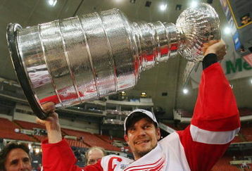 PITTSBURGH - JUNE 04: Nicklas Lidstrom #5 of the Detroit Red Wings celebrates with the Stanley Cup after defeating the Pittsburgh Penguins in game six of the 2008 NHL Stanley Cup Finals at Mellon Arena on June 4, 2008 in Pittsburgh. Pennsylvania. The Red Wings defeated the Penguins 3-2 to win the Stanley Cup Finals 4 games to 2. (Photo by Bruce Bennett/Getty Images)