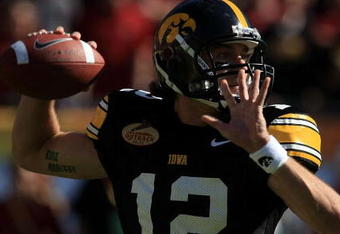 TAMPA, FL - JANUARY 01:  Ricky Stanzi #12 of the Iowa Hawkeyes drops back to pass against the South Carolina Gamecocks during the Outback Bowl on January 1, 2009 at Raymond James Stadium in Tampa, Florida.  (Photo by Scott Halleran/Getty Images)