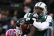 EAST RUTHERFORD, NJ - DECEMBER 14: Dustin Keller #81 of the New York Jets has a pass broken up by Bryan Scott #43 of the Buffalo Bills during their game on December 14, 2008 at Giants Stadium in East Rutherford, New Jersey. (Photo by Al Bello/Getty Images)