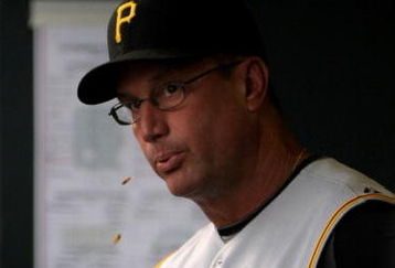 DENVER - JULY 19:  Manager John Russell #7 of the Pittsburgh Pirates spits sunflower seeds as he direct the action from the dugout against the Colorado Rockies at Coors Field on July 19, 2008 in Denver, Colorado. The Rockies defeated the Pirates 7-1.  (Photo by Doug Pensinger/Getty Images)