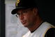 DENVER - JULY 19:  Manager John Russell #7 of the Pittsburgh Pirates spits sunflower seeds as he direct the action from the dugout against the Colorado Rockies at Coors Field on July 19, 2008 in Denver, Colorado. The Rockies defeated the Pirates 7-1.  (Photo by Doug Pensinger/Getty Images)