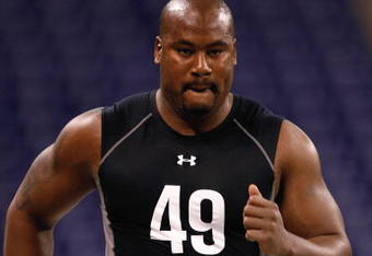 INDIANAPOLIS, IN - FEBRUARY 21:  Offensive lineman Jason Smith of Baylor runs the 40 yard dash during the NFL Scouting Combine presented by Under Armour at Lucas Oil Stadium on February 21, 2009 in Indianapolis, Indiana. (Photo by Scott Boehm/Getty Images)
