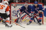 NEW YORK - APRIL 09: Henrik Lundqvist #30 and Chris Drury #23 of the New York Rangers defend against Joffrey Lupul #15 of the Philadelphia Flyers on April 9, 2009 at Madison Square Garden in New York City. The Rangers defeated the Flyers 2-1 to gain a playoff spot. (Photo by Bruce Bennett/Getty Images)