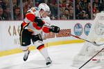 DETROIT - DECEMBER 10:  Mike Cammalleri #13 of the Calgary Flames skates during the game against the Detroit Red Wings at Joe Louis Arena December on 10, 2008 in Detroit, Michigan. (Photo by Dave Sandford/Getty Images)