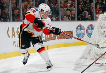 DETROIT - DECEMBER 10:  Mike Cammalleri #13 of the Calgary Flames skates during the game against the Detroit Red Wings at Joe Louis Arena December on 10, 2008 in Detroit, Michigan. (Photo by Dave Sandford/Getty Images)