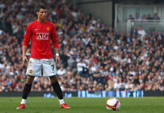 LONDON - MARCH 21:  Cristiano Ronaldo of Manchester United stands ready to take a free kick during the Barclays Premier League match between Fulham and Manchester United at Craven Cottage on March 21, 2009 in London, England.  (Photo by Ryan Pierse/Getty Images)