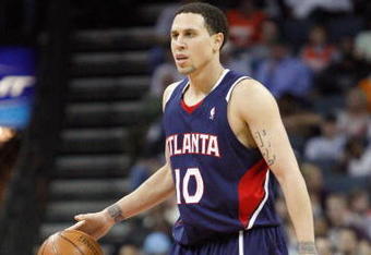 CHARLOTTE, NC - MARCH 6:  Mike Bibby #10 of the Atlanta Hawks dribbles the ball against the Charlotte Bobcats during their game at Time Warner Cable Arena on March 6, 2009 in Charlotte, North Carolina.  NOTE TO USER: User expressly acknowledges and agrees that, by downloading and/or using this Photograph, user is consenting to the terms and conditions of the Getty Images License Agreement. (Photo by: Streeter Lecka/Getty Images)