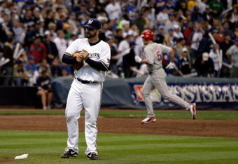 MILWAUKEE - OCTOBER 05:  Jeff Suppan #37 of the Milwaukee Brewers rubs up a new ball after surrendering a third inning three run home run to Pat Burrell #5 of the Philadelphia Phillies in game four of the NLDS during the 2008 MLB playoffs at Miller Park on October 5, 2008 in Milwaukee, Wisconsin.  (Photo by Jim McIsaac/Getty Images)
