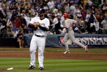 MILWAUKEE - OCTOBER 05:  Jeff Suppan #37 of the Milwaukee Brewers rubs up a new ball after surrendering a third inning three run home run to Pat Burrell #5 of the Philadelphia Phillies in game four of the NLDS during the 2008 MLB playoffs at Miller Park on October 5, 2008 in Milwaukee, Wisconsin.  (Photo by Jim McIsaac/Getty Images)