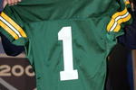 NEW YORK - APRIL 23:  Quarterback Aaron Rodgers (California) poses with his jersey after being drafted 24th overall by the Green Bay Packers during the 70th NFL Draft on April 23, 2005 at the Jacob K. Javits Convention Center in New York City.  (Photo by Chris Trotman/Getty Images)
