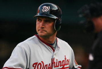 MIAMI - APRIL 06:  Ryan Zimmerman #11 of the Washington Nationals looks back toward the field after striking out looking in the eighth inning against the Florida Marlins on opening day at Dolphin Stadium on April 6, 2009 in Miami, Florida. The Marlins defeated the Nationals 12-5.  (Photo by Doug Benc/Getty Images)
