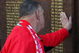 LIVERPOOL, ENGLAND - APRIL 11: A Liverpool fan pays his respects to those who died in the Hillsborough disaster prior to the during the Barclays Premier League match obetween Liverpool and Blackburn at Anfield on April 11, 2009 in Liverpool, England. On April 15 it will be the 20th anniversary of the Hillsborough disaster, the bells of Liverpools two cathedrals will ring 96 times in memory of the 96 fans who lost their lives. At 3:06pm, exactly 20 years since the match was abandoned Liverpools public transport will stop for 2 minutes. There will also be a memorial service on the Kop where 96 candles will be lit and a representative from each family will be awarded the freedom of the city. (Photo by Clive Rose/Getty Images)