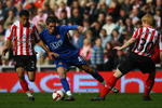 SUNDERLAND, ENGLAND - APRIL 11:  Federico Macheda of Manchester United is challenged by Carlos Edwards and Paul McShane of Sunderland during the Barclays Premier League match between Sunderland and Manchester United at The Stadium of Light on April 11, 2009 in Sunderland, England.  (Photo by Alex Livesey/Getty Images)