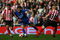 SUNDERLAND, ENGLAND - APRIL 11:  Federico Macheda of Manchester United is challenged by Carlos Edwards and Paul McShane of Sunderland during the Barclays Premier League match between Sunderland and Manchester United at The Stadium of Light on April 11, 2009 in Sunderland, England.  (Photo by Alex Livesey/Getty Images)