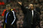 LIVERPOOL, ENGLAND - APRIL 08:  Liverpool Manager Rafael Benitez gestures as Chelsea Caretaker Manager Guus Hiddink looks on during the UEFA Champions League Quarter Final First Leg match between Liverpool and Chelsea at Anfield on April 8, 2009 in Liverpool, England.  (Photo by Clive Rose/Getty Images)