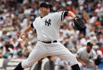NEW YORK - JULY 30:  Joba Chamberlain #62 of the New York Yankees deals a pitch against the Baltimore Orioles on July 30, 2008 at Yankee Stadium in the Bronx borough of New York City.  (Photo by Jim McIsaac/Getty Images)