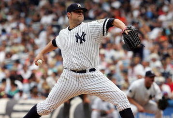NEW YORK - JULY 30:  Joba Chamberlain #62 of the New York Yankees deals a pitch against the Baltimore Orioles on July 30, 2008 at Yankee Stadium in the Bronx borough of New York City.  (Photo by Jim McIsaac/Getty Images)